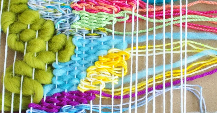 An example of "doodle weaving," a loose tapestry style making abstract shapes out of different thicknesses of yarn.
