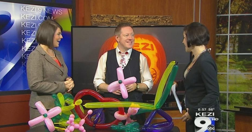 Jay Frasier appears on a local TV news program showing the anchors a variety of balloon sculptures.