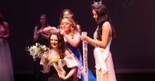 Alyse Perez is crowned Miss City of Sunshine 2026 by 2025's winner, Melanie Potter; Miss Oregon 2025 stands next to them with the "Miss City of Sunshine" award sash.